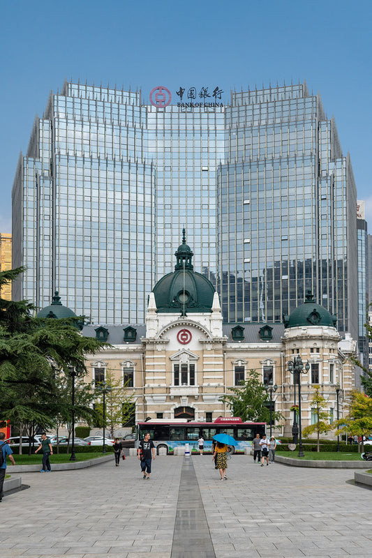Bank of China tower and historic bank building in Dalian