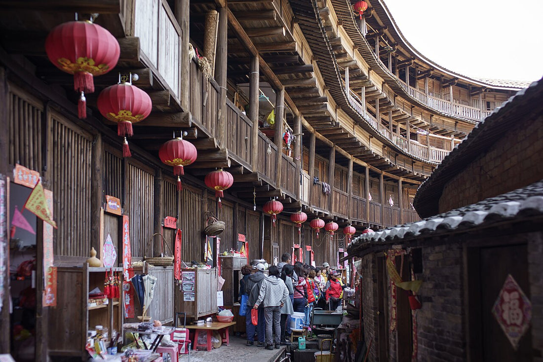 Curved wooden galleries and lanterns around the interior of Chengqi Lou