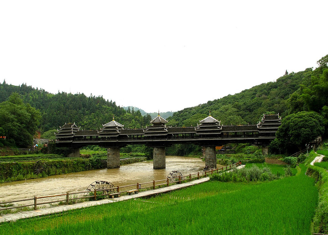 Chengyang Yongji Bridge with five roofed pavilions spanning a river