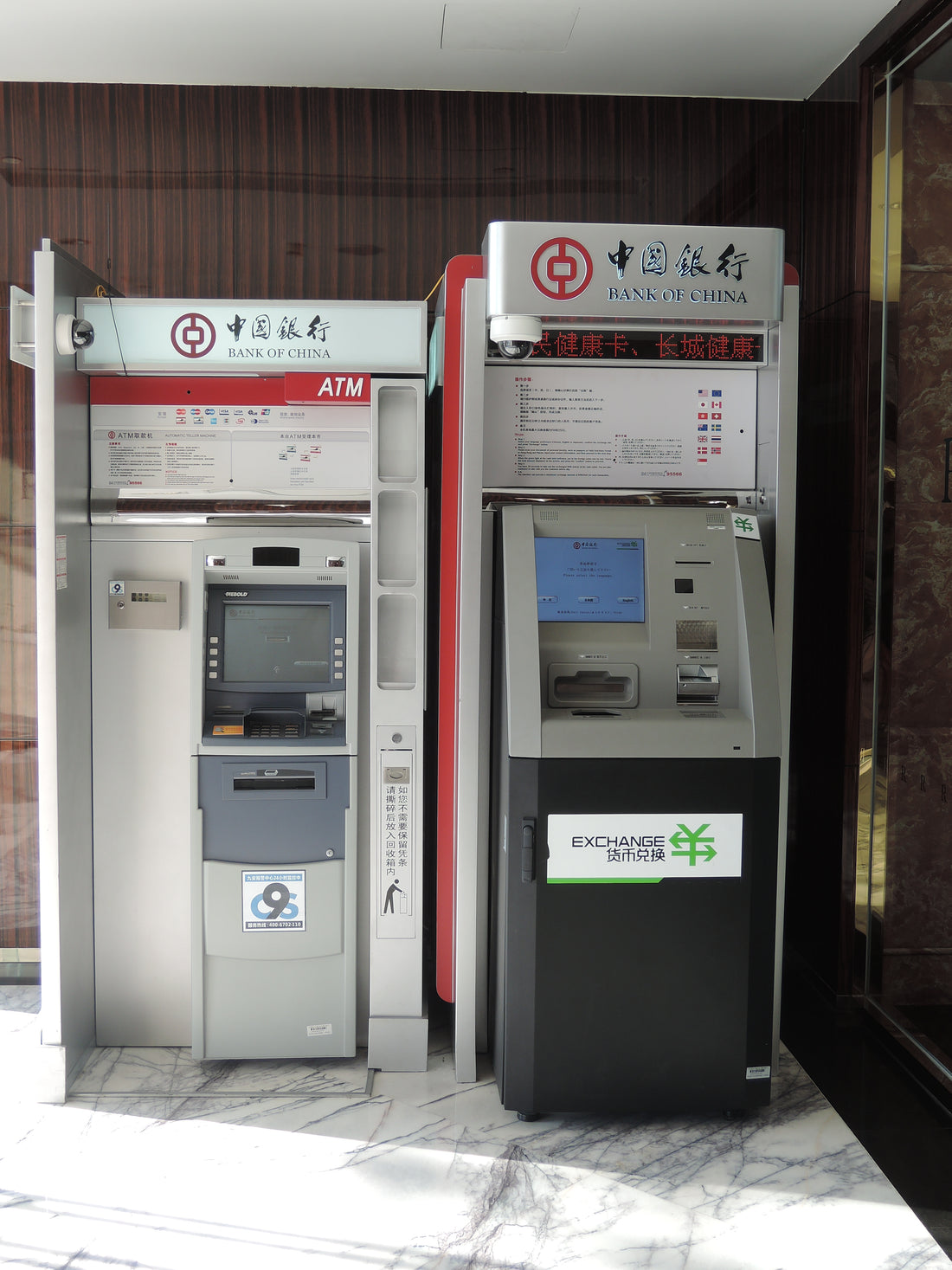 Bank of China ATM on the left beside a separate currency-exchange machine in Shanghai