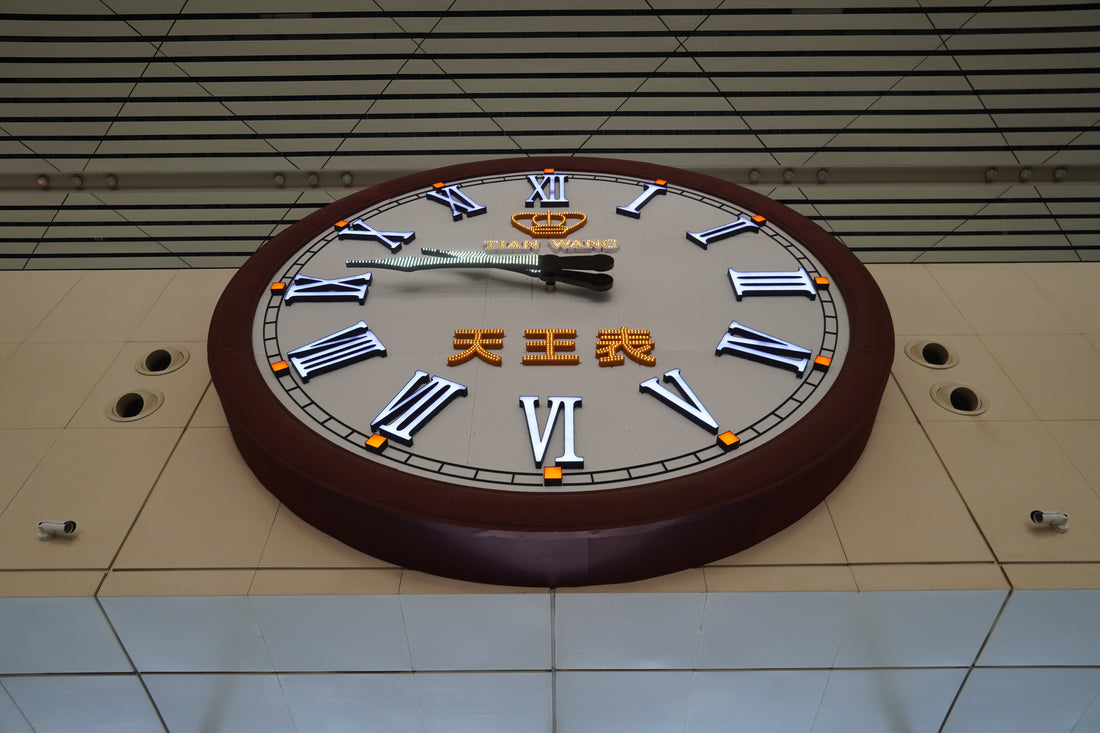 Large wall clock above the concourse at Zhengzhou East Railway Station