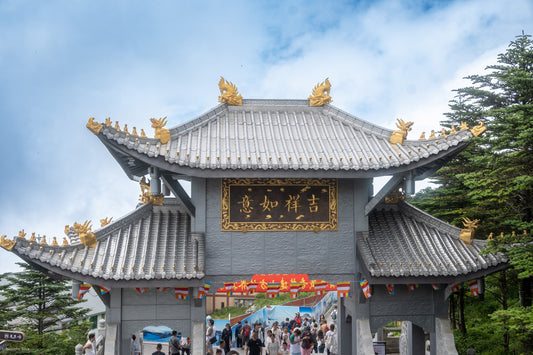 Golden Summit buildings and mountain landscape at Mount Emei