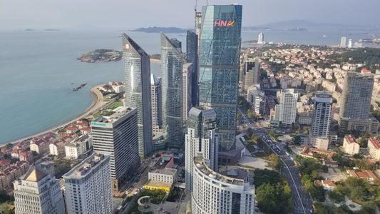 Qingdao waterfront skyline seen across the bay