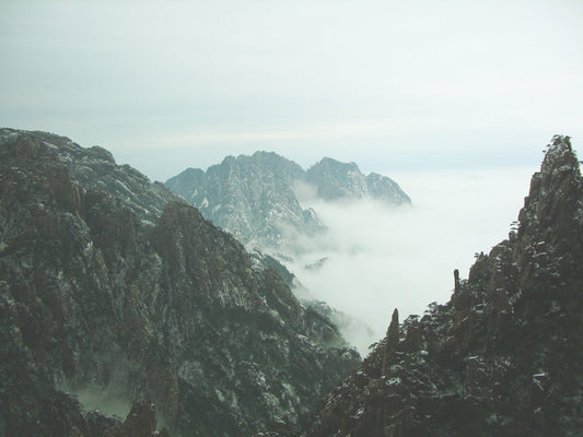 Cloud sea surrounding granite peaks at Huangshan Scenic Area